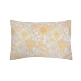 Daphne Duvet Cover Set features vibrant retro floral prints in yellows and peaches, made from 100% cotton, reversible design included.