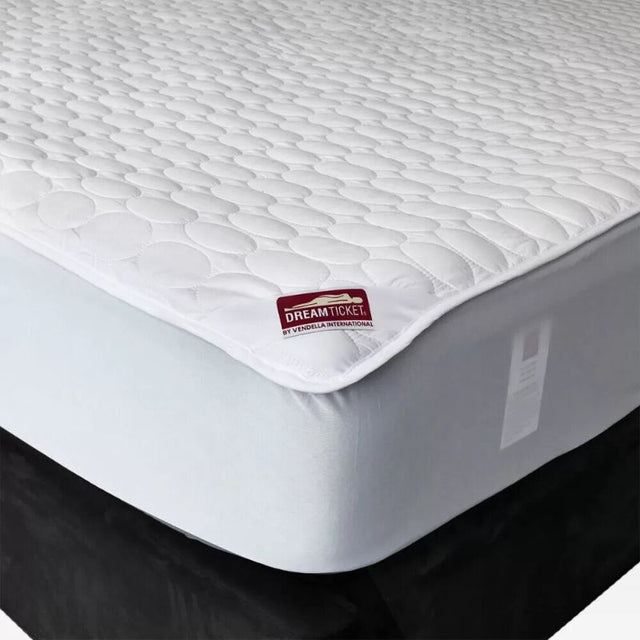 Quilted mattress protector with a snug fit, hypo-allergenic materials, and eco-friendly microfibre for ultimate comfort.