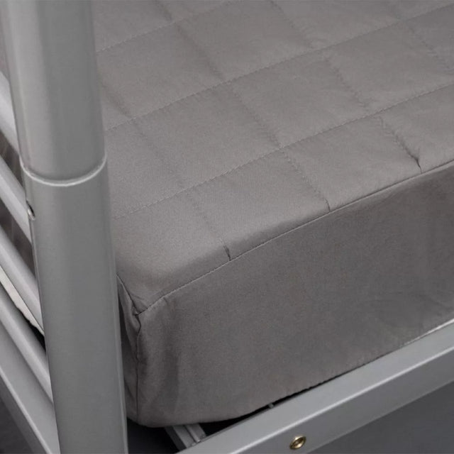 Charcoal quilted mattress protector, hypoallergenic, fits mattresses up to 17cm, eco-friendly from recycled materials.