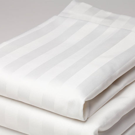 Luxurious white pillow slip with 20mm sateen stripes, crafted from a durable 50/50 polyester-cotton blend for ultimate comfort.