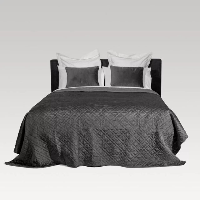 Luxurious pewter quilted coverlet in soft Holland Velvet, designed for Super King beds, versatile for year-round style.