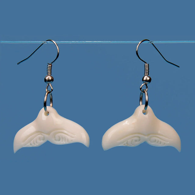 Bone Whale Tail Earrings handcrafted from beef bone, celebrating Kiwiana and Maori culture with unique designs.