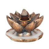 Elegant bronze lotus incense burner creating a mesmerizing smoke waterfall effect for a serene ambiance.