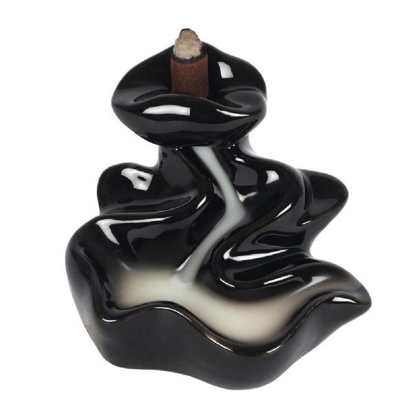 Elegant black ceramic River Backflow Incense Burner creating a mesmerizing waterfall smoke effect for relaxation and ambiance.