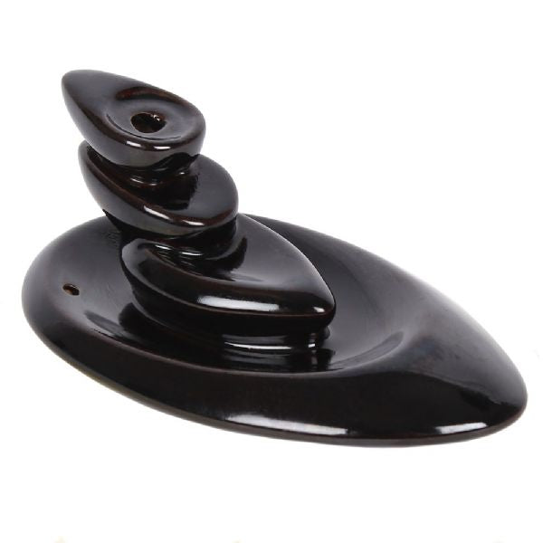 Small Pebbles Backflow Incense Burner featuring a stacked pebble design with cascading smoke for a calming ambiance.