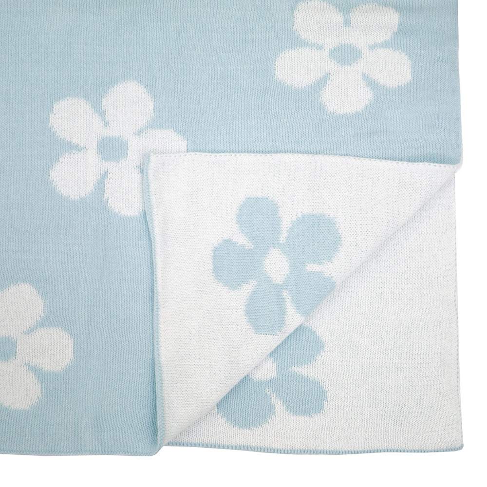 Anthea Throw Cloud by Bambury in pastel tones, featuring a daisy pattern, perfect for cozying up or enhancing decor.
