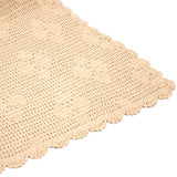 Hand-crocheted cotton throw in custard with floral motif, perfect for layering on sofas or beds, easy to care for.