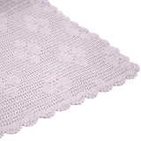 Hand-crocheted lilac throw featuring a floral pattern, made of 100% cotton, ideal for cozying up any living space.