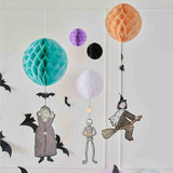 Colorful paper honeycombs and card characters for spooky Halloween decorations, perfect for festive home decor.