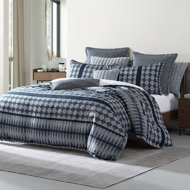 Super King duvet cover set in slate blue and silver grey, featuring stripes and geometric designs with tailored self-flange finish.