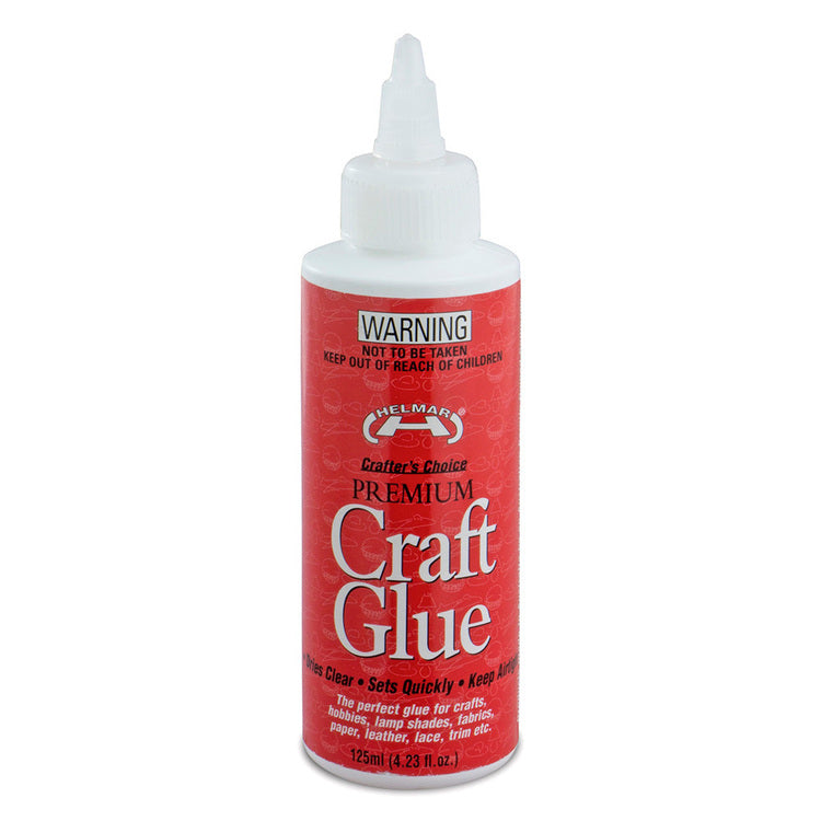 Helmar Craft Glue 50ml in a bottle, ideal for bonding fabrics, paper, leather, and more for various crafts.