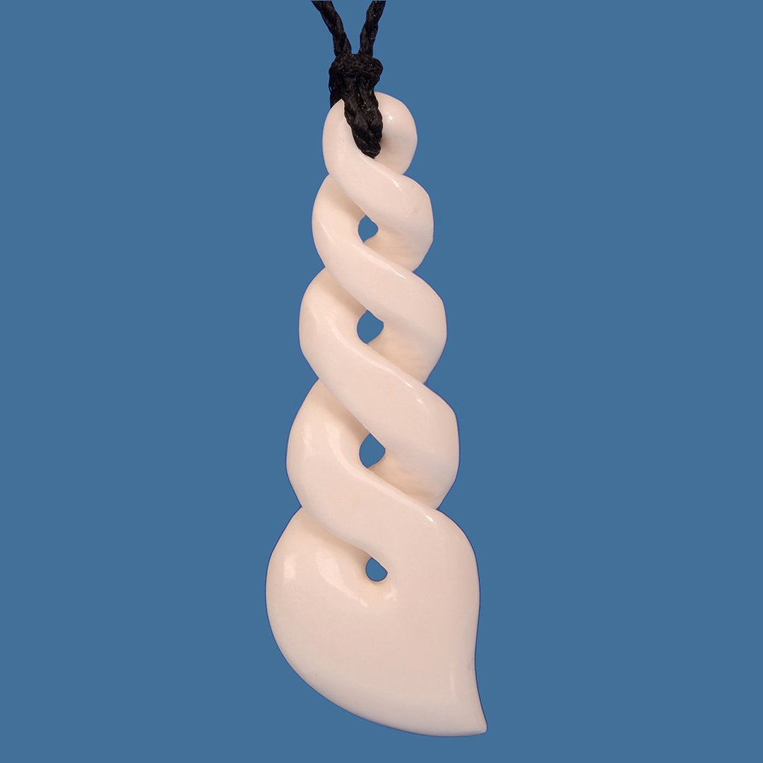 Bone Quad Twist Pendant featuring unique Maori carving, symbolizing life's journey and bonds, on an adjustable black cord.