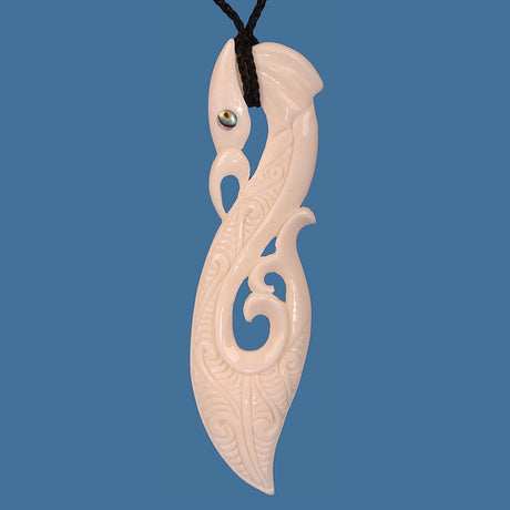 Extra large Bone Manaia pendant featuring intricate carving for protection, on an adjustable black cord, celebrating Maori artistry.