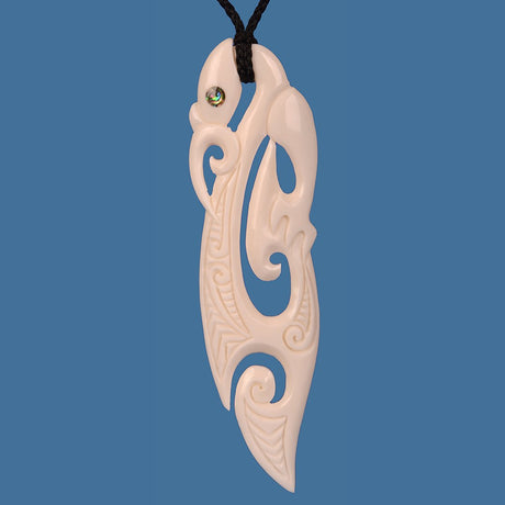 XL Bone Manaia Pendant on adjustable cord, hand-carved from beef bone; symbolizes protection and good fortune in Maori culture.