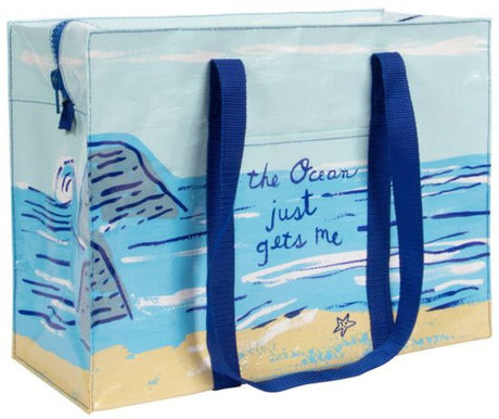 Eco-friendly shoulder tote bag with ocean design, perfect for beach essentials, made from 95% recycled materials.