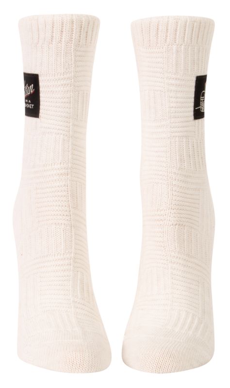 Light blue socks featuring a playful kitten in a basket design, made from organic cotton with spandex for comfort and durability.