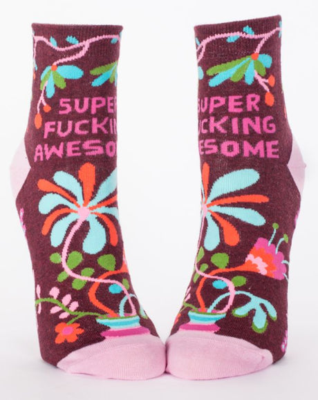 Bright blue ankle socks with fun text, perfect for women's sizes 5-10, blending comfort and quirky style.