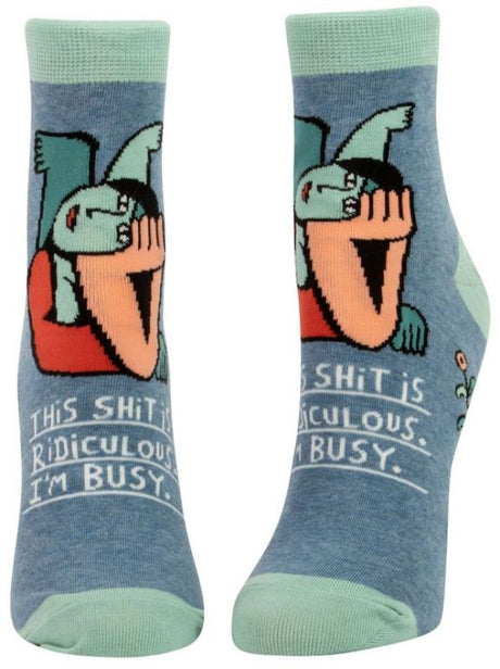 Blue Q ankle socks featuring a humorous message, made from a comfy cotton blend for women's sizes 5-10.