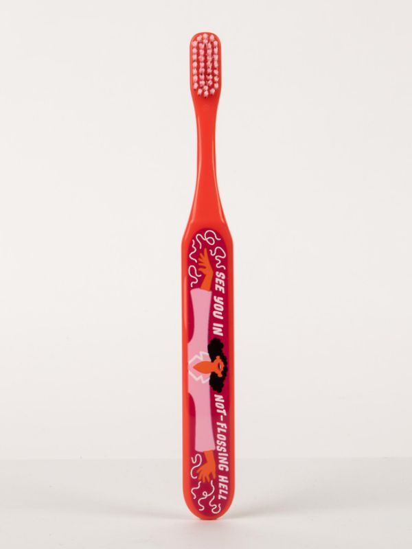 Humorous Blue Q toothbrush with soft bristles, wide handle, and BPA-free design for effective, comfortable brushing.