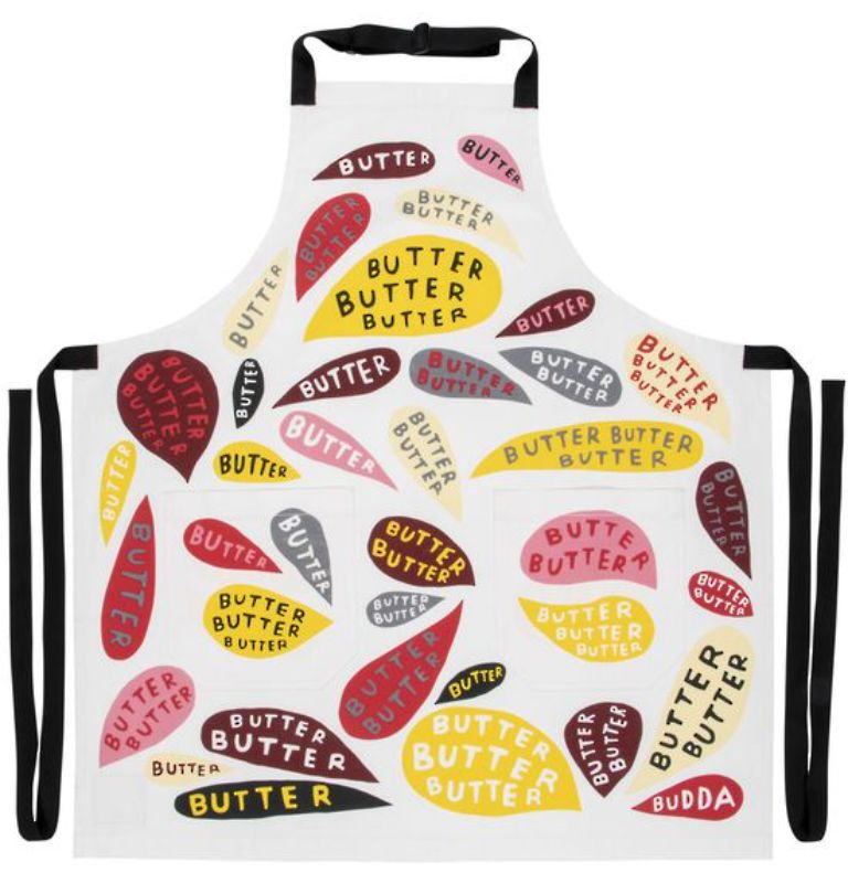 Whimsical 'Butter Butter Butter' apron in heavy cotton twill with pockets, adjustable neck strap, and extra-long waist ties.