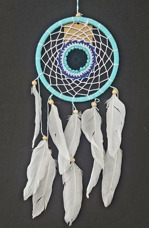 Handcrafted 12cm crochet dreamcatcher featuring the Nazar symbol for protection and peace, perfect for stylish home decor.