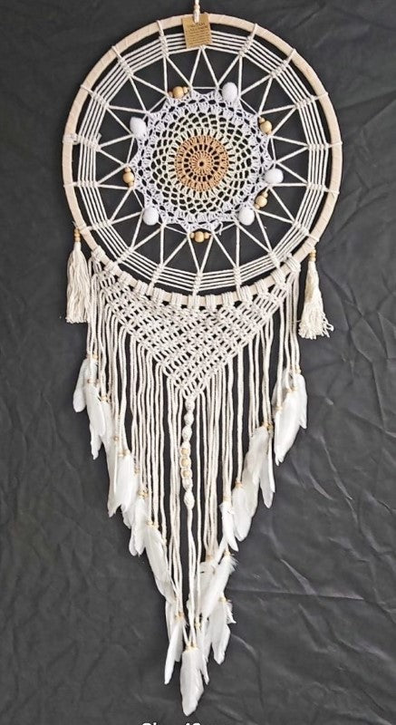 White crochet dreamcatcher, 42cm, featuring intricate patterns for serene home decor and promoting sweet dreams and positivity.