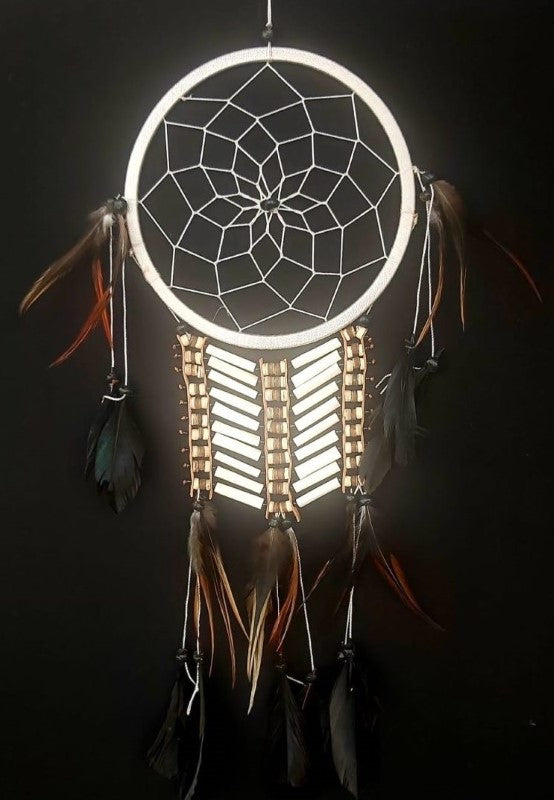 Elegant white dreamcatchers with bone accents, 15cm in size, perfect for serene wall decor and promoting positive energy.