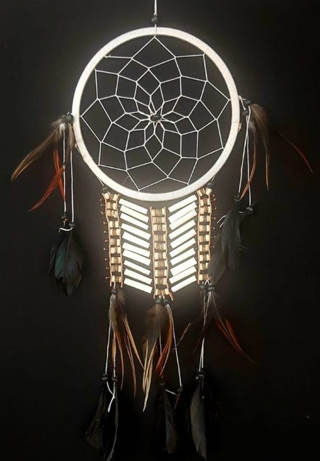 Elegant white dreamcatchers with bone accents, 15cm in size, perfect for serene wall decor and promoting positive energy.