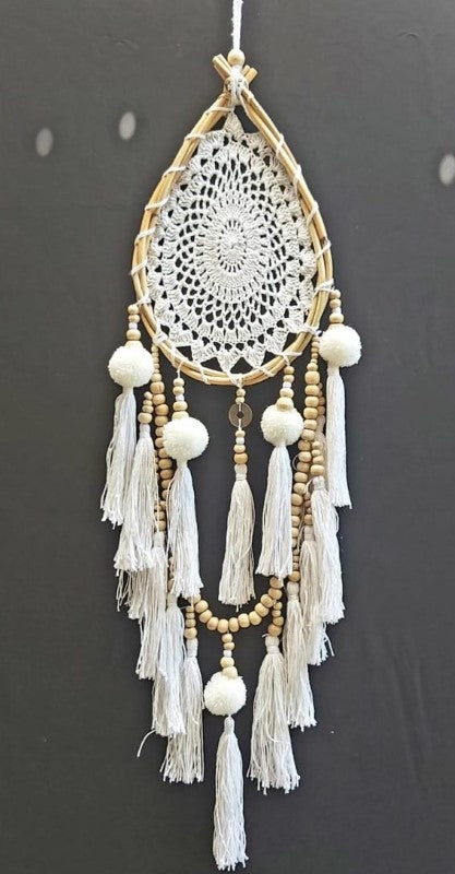 Teardrop-shaped white crochet dreamcatcher, 16cm, handcrafted to enhance bohemian home decor and promote restful sleep.