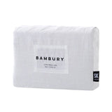 Luxurious ivory double duvet cover set made of 100% French linen, known for softness, durability, and breathability.