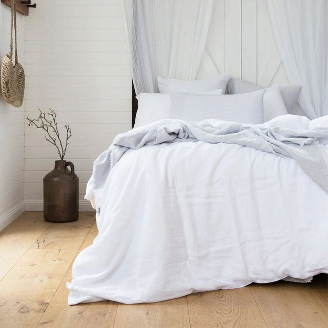 Luxurious ivory super king duvet cover set in 100% French flax linen, featuring a soft, breathable, and stylish design.