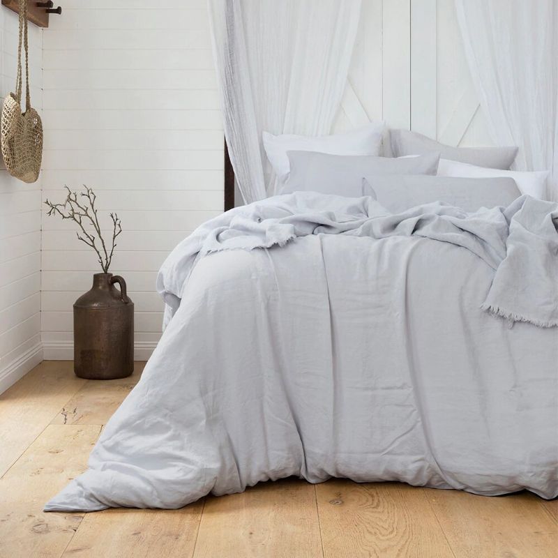 Double duvet cover set in sophisticated silver, made from 100% French linen for breathable comfort and elegance.