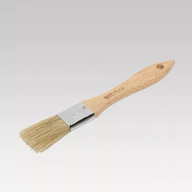 Silicone pastry brush with high-quality bristles, ideal for glazes and marinades, safe and heat resistant up to 220°C.