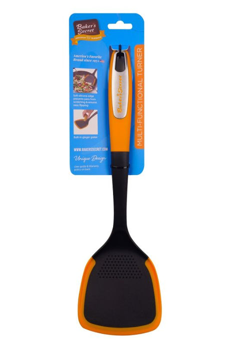 Silicone Turner (33cm) with soft edge to protect pans, built-in ginger grater, heat resistant, and dishwasher safe.