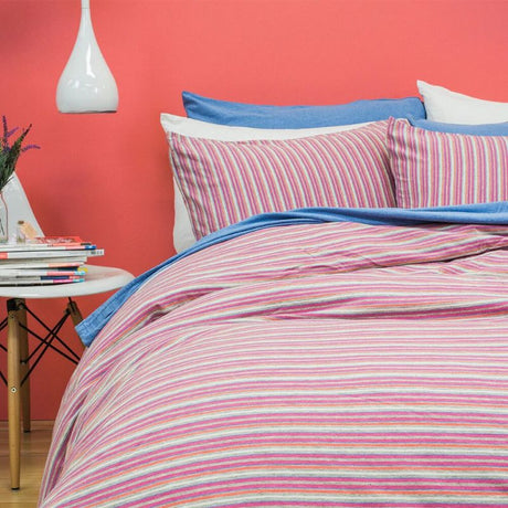 Double duvet cover set in pink and natural stripes, made of 100% soft cotton for all-season comfort.