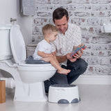 Bumbo Step n' Potty in Cool Grey, a versatile 2-in-1 potty trainer for toddlers with comfort, safety, and independence features.