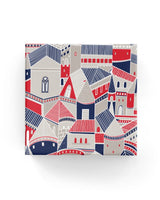 Elegant wrapping paper featuring whimsical castles in taupe, navy, and red, perfect for any special occasion.