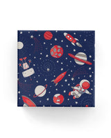 Space-themed wrapping paper in navy, taupe, and red, perfect for elegant gift presentation and creative celebrations.