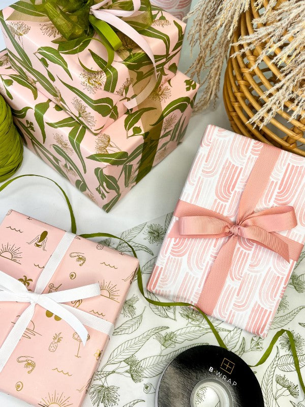 Elegant watercolour arches on matte dusty pink wrapping paper, perfect for gift-giving occasions, measuring 600mm x 40m.