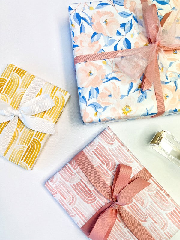Watercolour arches design on matte mustard wrapping paper, 600mm wide x 40m long, perfect for stylish gift wrapping.