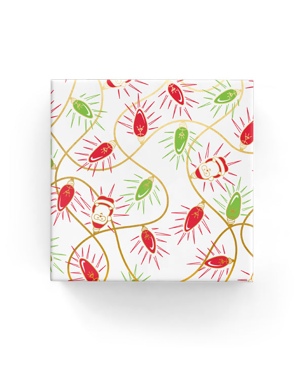 Vibrant gold, red, and green Xmas lights wrapping paper roll, 60cm x 40m, perfect for festive gift wrapping.