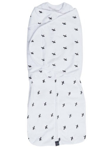 DreamSwaddle in Black Criss-Cross, a snug, soft cotton wrap for comfy, secure baby sleep with easy diaper changes.
