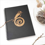 Kiwiana Black Journal featuring a King Fisher on koru design, perfect for creative writing and artistic expression.