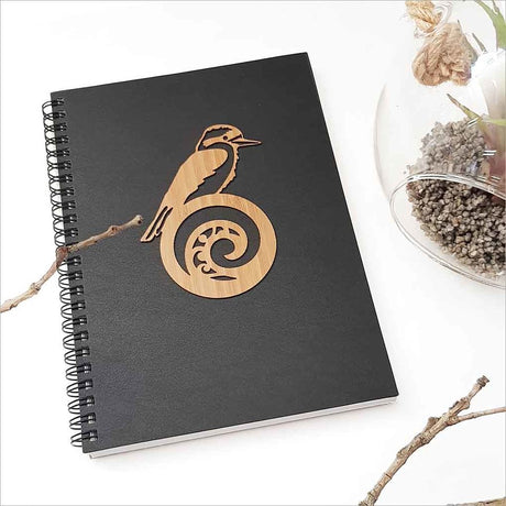 Kiwiana Black Journal featuring a King Fisher on koru design, perfect for creative writing and artistic expression.