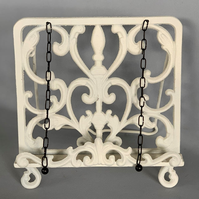 White cast iron book stand, 30 x 30cm, combines elegance and functionality for stylish book display and easy reading.