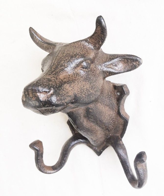 Bulls Head Ornament with two hooks, 17cm, adds rustic charm and functionality to any room, perfect for keys and hats.