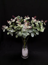 Lifelike green and red Eucalyptus bush, perfect for low-light decor, adds elegance without maintenance.