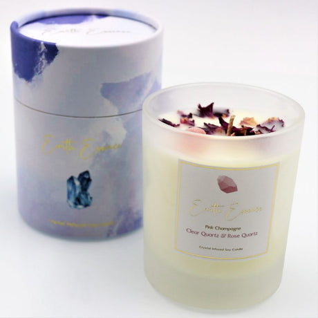 Soy wax candle in crystal pink champagne with Rose Quartz, Clear Quartz, and dried rose petals; 40-hour burn time.