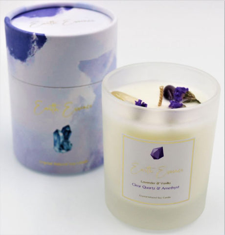 Soy wax candle featuring lavender and vanilla scents, adorned with Amethyst, Clear Quartz, and dried Forget-Me-Not flowers.