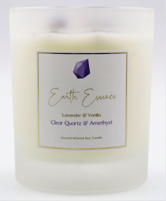 Soy wax candle with lavender vanilla scent, crystals, and dried flowers, measuring 9.3cm for 40 hours of calming ambiance.